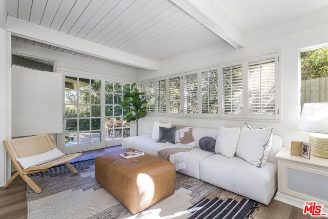 sunroom with beam ceiling and wood ceiling