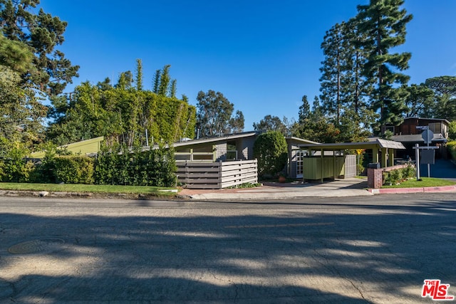 view of front of house with a carport