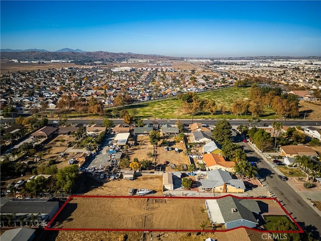 drone / aerial view featuring a mountain view