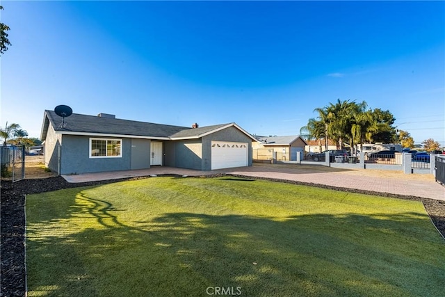 single story home featuring a garage and a front lawn