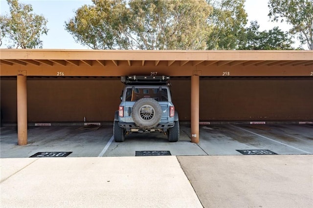 view of parking with a carport