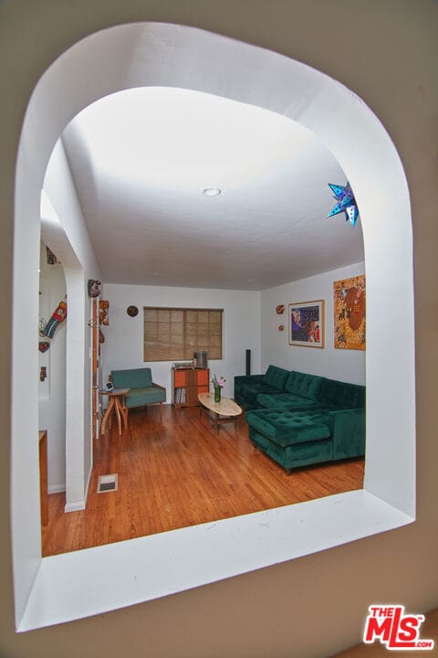 living room with hardwood / wood-style flooring