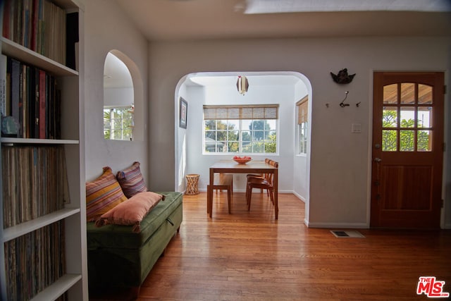 foyer entrance featuring hardwood / wood-style flooring