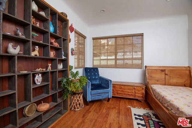 living area with wood-type flooring