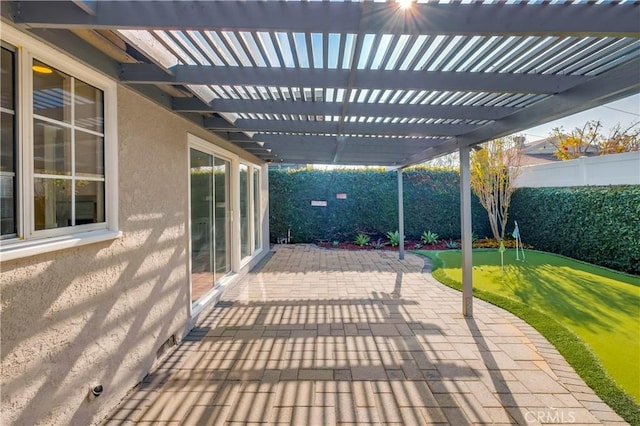 view of patio featuring a pergola