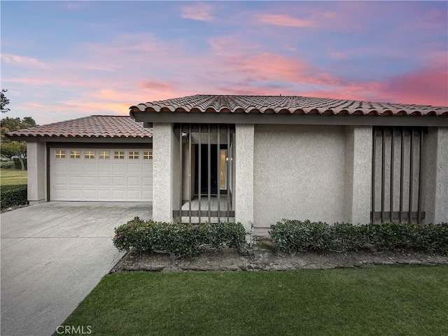 view of front of home with a garage