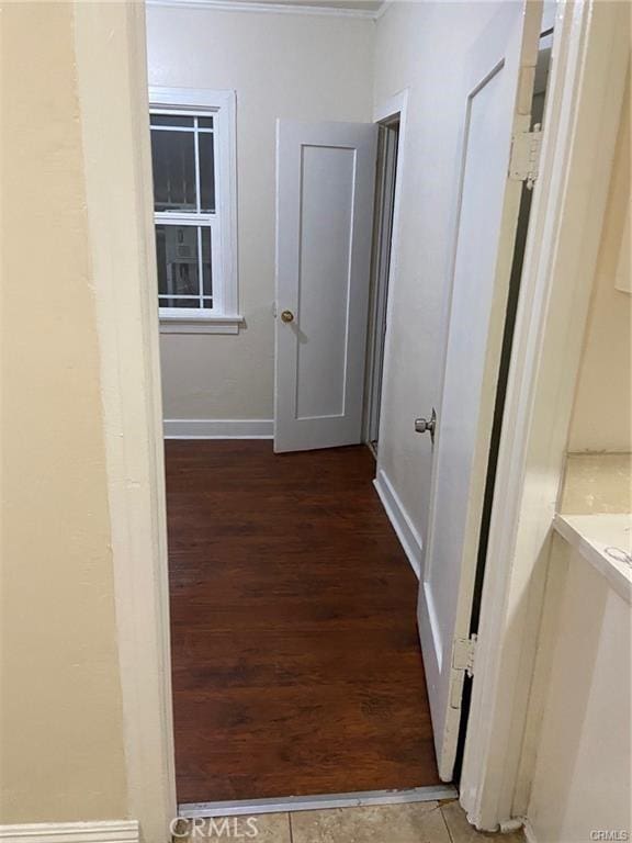 hallway featuring dark wood-type flooring