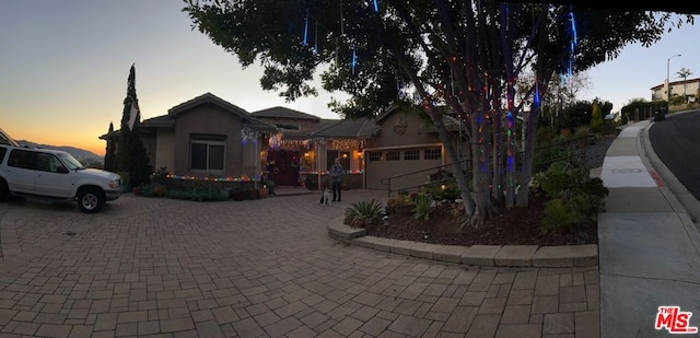 view of front of property featuring a garage