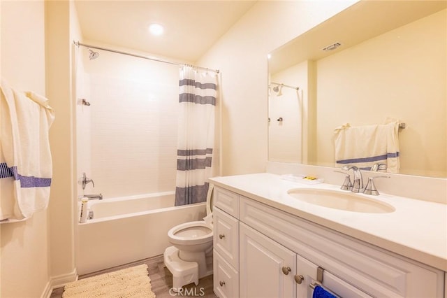 full bathroom with hardwood / wood-style flooring, vanity, toilet, and shower / bath combo with shower curtain