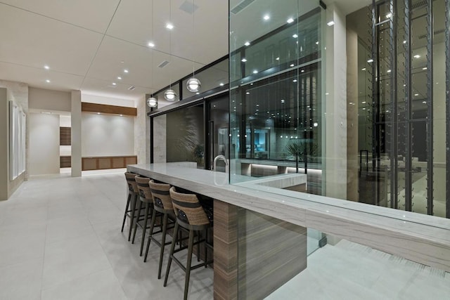 bar with light tile patterned flooring