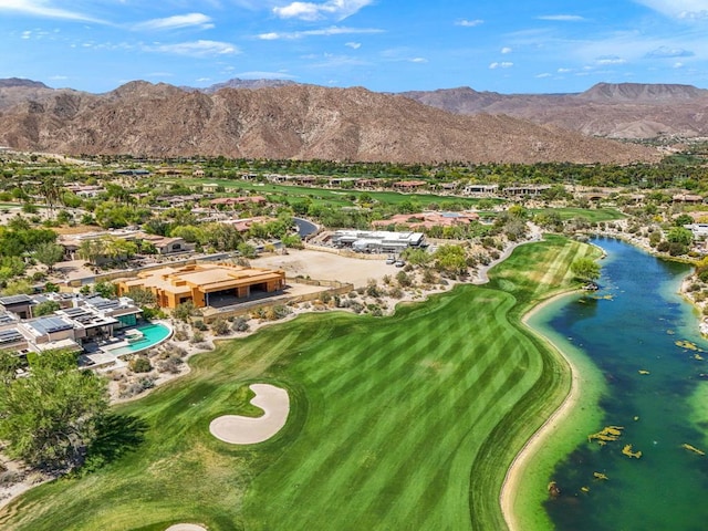 bird's eye view with a water and mountain view