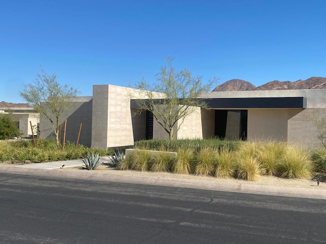 exterior space featuring a mountain view