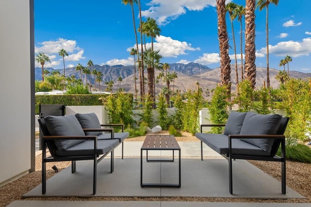 view of patio / terrace with a mountain view