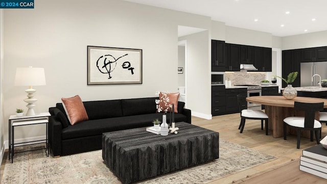 living room with light hardwood / wood-style floors