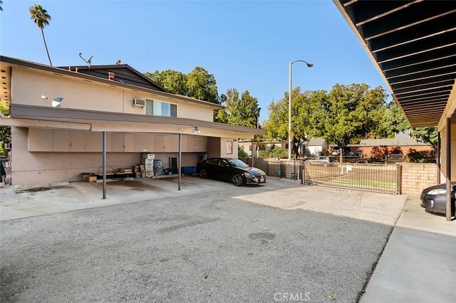 view of parking with a carport