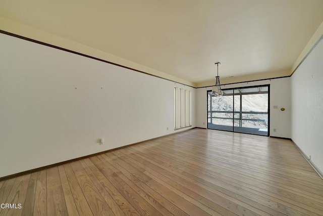 unfurnished dining area featuring light hardwood / wood-style floors