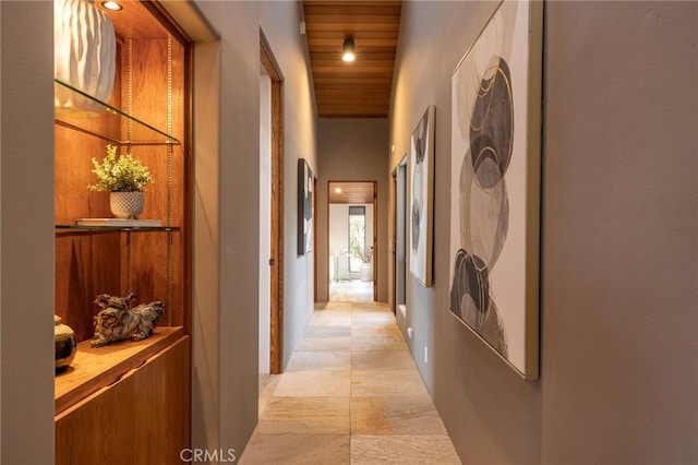 corridor featuring wooden ceiling