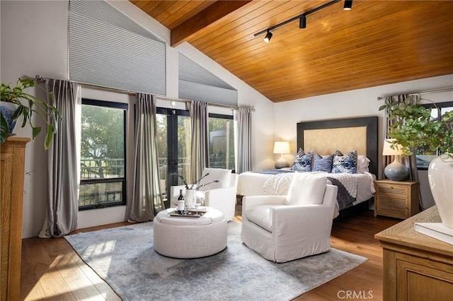 bedroom with beam ceiling, wood-type flooring, wood ceiling, high vaulted ceiling, and french doors