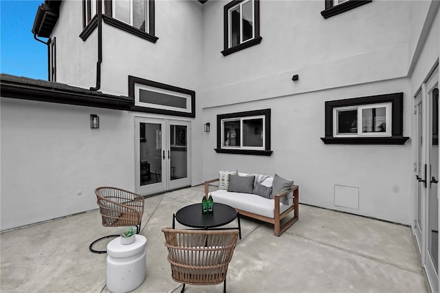 view of patio / terrace featuring french doors and an outdoor living space