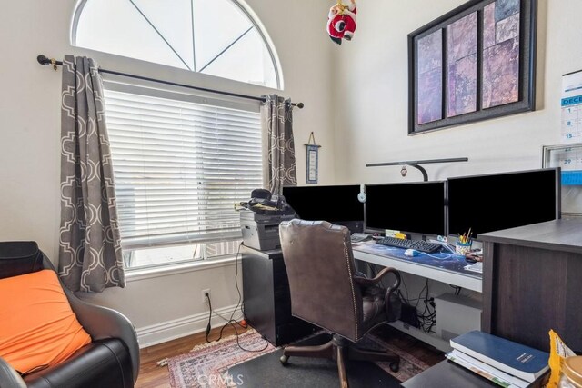 office area with hardwood / wood-style floors