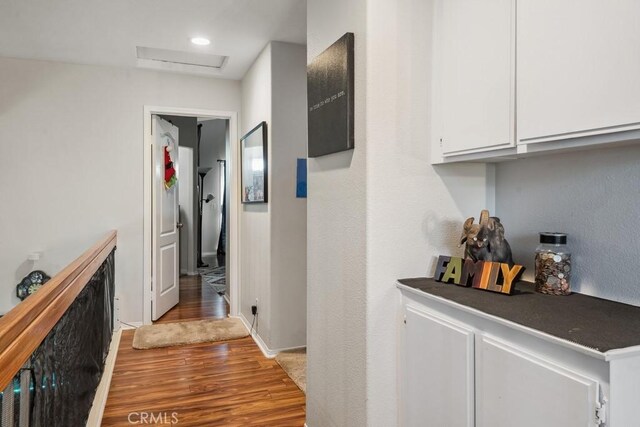 hallway featuring wood-type flooring