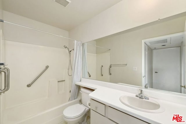 full bathroom featuring vanity, toilet, and shower / bath combo with shower curtain