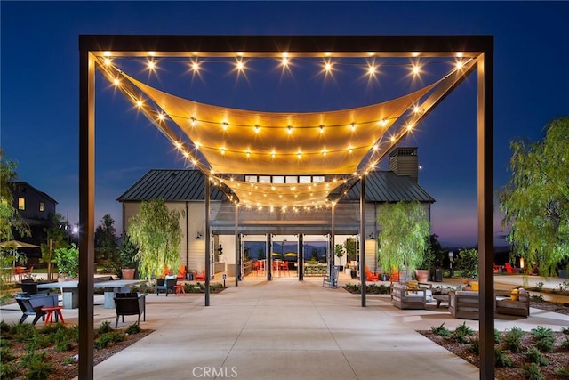 surrounding community featuring a patio area