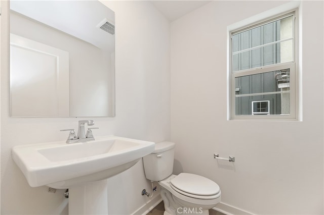 bathroom with sink and toilet