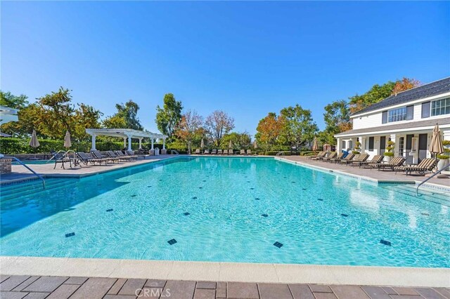 view of pool with a pergola