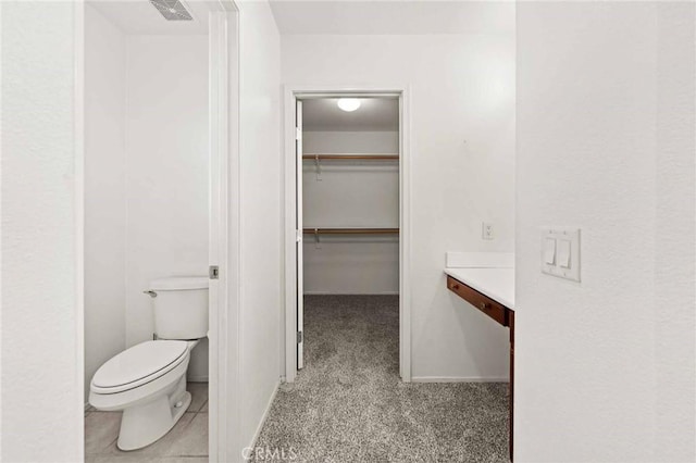 bathroom featuring toilet