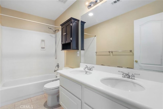 full bathroom with tile patterned floors, vanity,  shower combination, and toilet