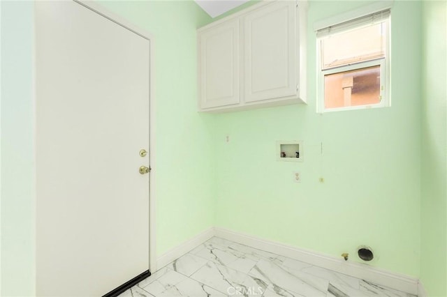 laundry room featuring cabinets, washer hookup, and electric dryer hookup