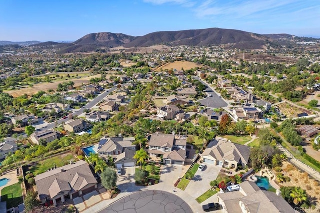 bird's eye view with a residential view and a mountain view