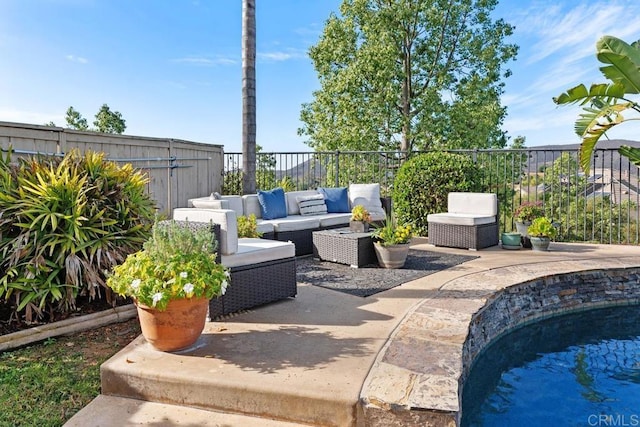 view of patio with a fenced backyard and an outdoor hangout area