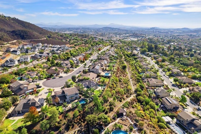 bird's eye view with a residential view and a mountain view