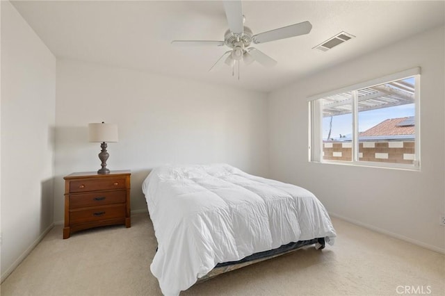 9551 San Rafael Dr, Desert Hot Springs, CA 92240 - bedroom featuring light colored carpet and a ceiling fan