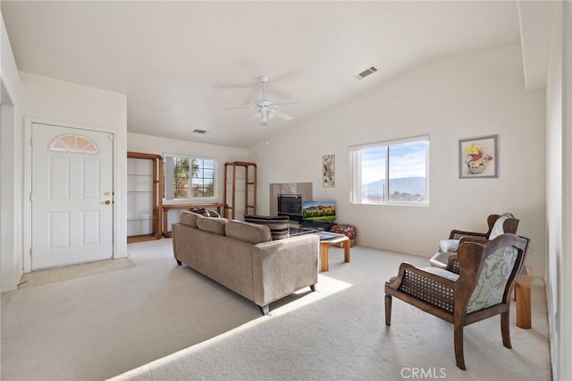 9551 San Rafael Dr, Desert Hot Springs, CA 92240 - carpeted living room with a wealth of natural light, lofted ceiling, and ceiling fan