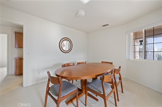 9551 San Rafael Dr, Desert Hot Springs, CA 92240 - dining room featuring light colored carpet