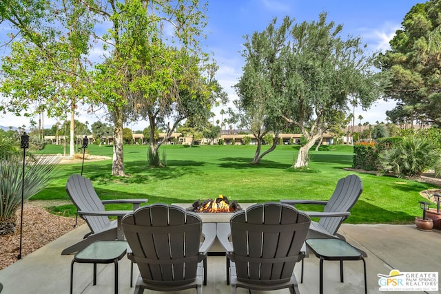 view of patio featuring a fire pit