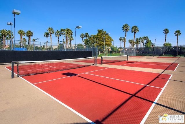 view of tennis court featuring basketball court