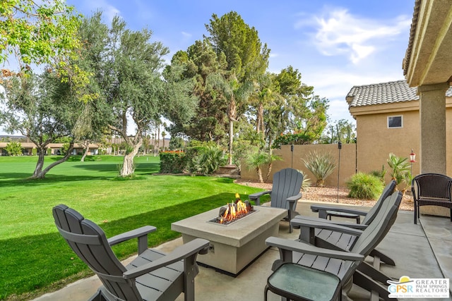 view of patio featuring an outdoor fire pit