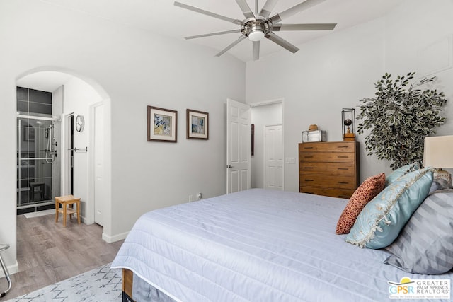 bedroom with ceiling fan and light hardwood / wood-style flooring