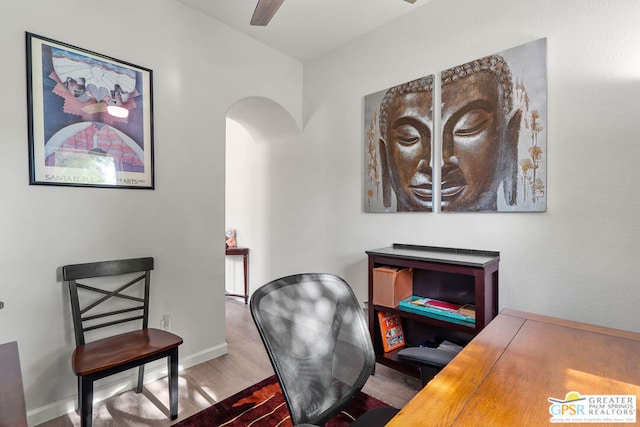 home office with ceiling fan and wood-type flooring