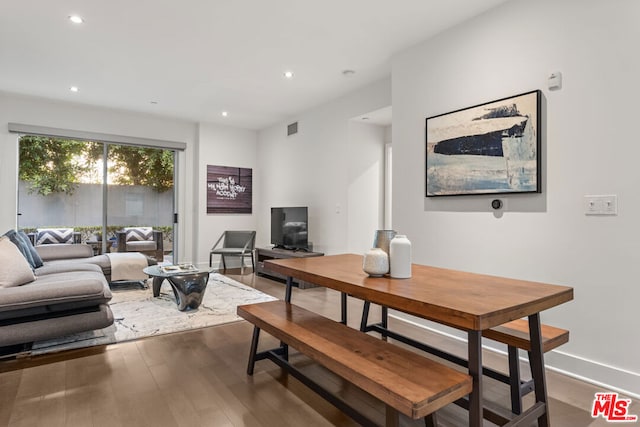 dining area featuring hardwood / wood-style floors