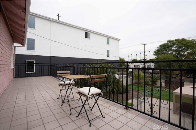 view of patio with a balcony