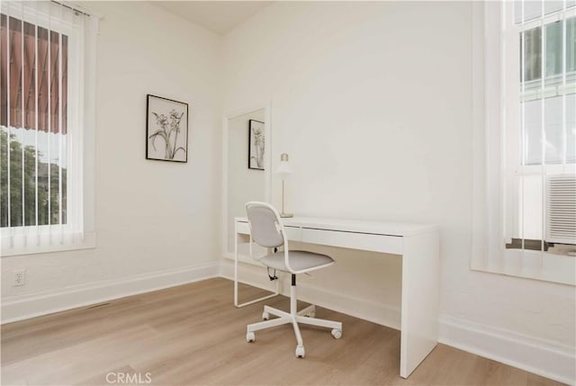 home office featuring light wood-type flooring