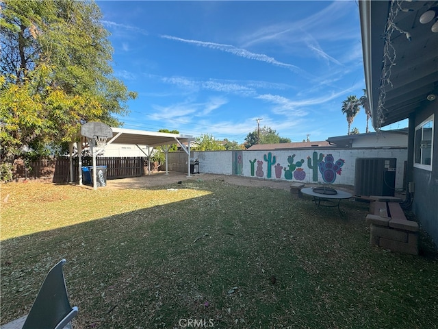 view of yard featuring central AC unit