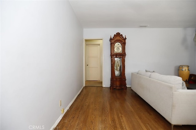 living room featuring dark hardwood / wood-style flooring