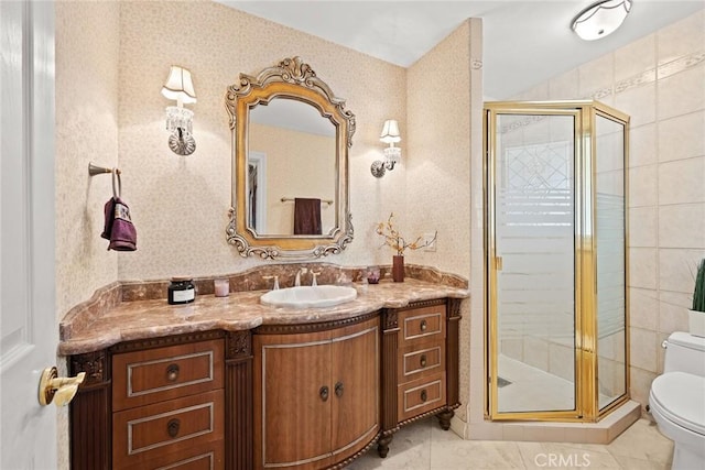 full bathroom with a shower stall, wallpapered walls, toilet, and vanity