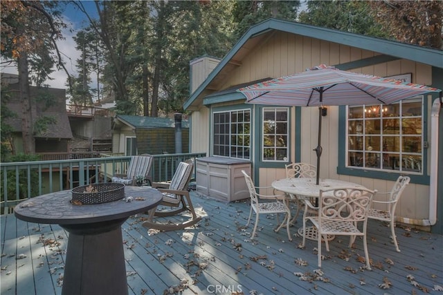 deck featuring a fire pit